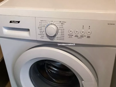 Machine à laver avec 7 mois d'utilisation et une garantie d'un an